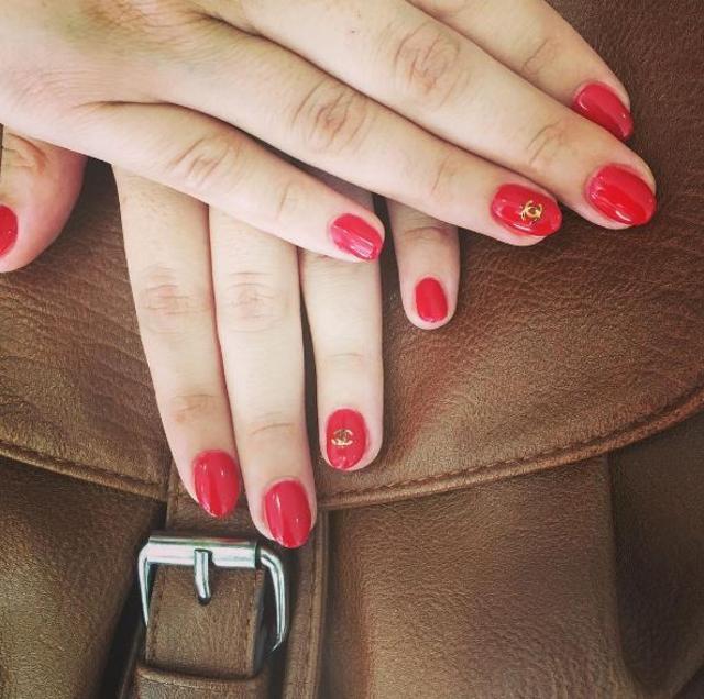 All tones of red ranging from coral red, to classic red carpet red to deep red are hot this season. (Instagram)