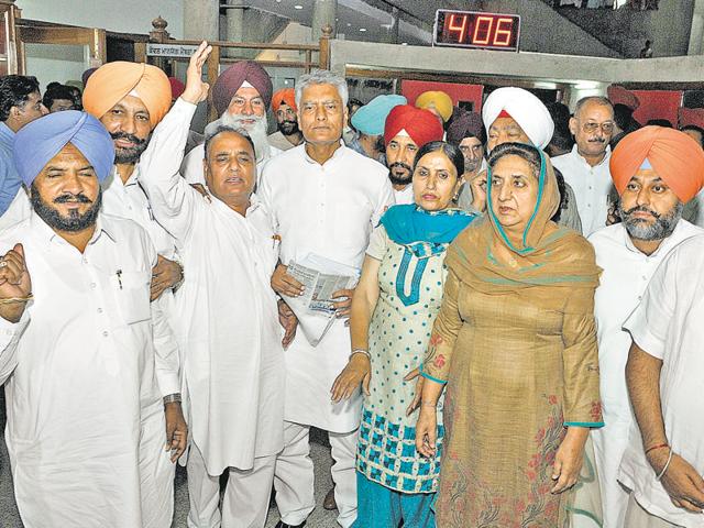 Punjab Congress leaders protesting during the monsoon session of the assembly in Chandigarh on Monday. (Keshav Singh/HT) Punjab Congress leaders protesting during the monsoon session of the assembly in Chandigarh on Monday. (Keshav Singh/HT)