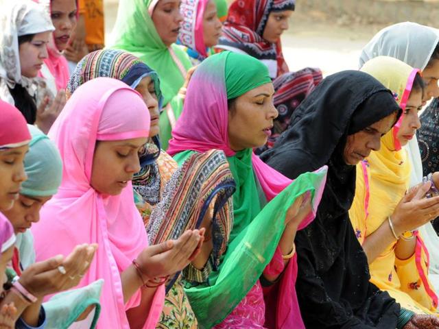 Women offering Eid prayers in Bank Colony, Patiala, on Tuesday. (Bharat Bhushan/HT)