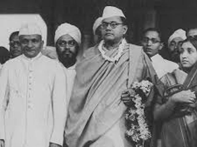 Netaji’s grandnephew Chandra Bose (left, in white kurta) having a look at the secret files after some of those were declassified in Kolkata last year.(HT Photo)