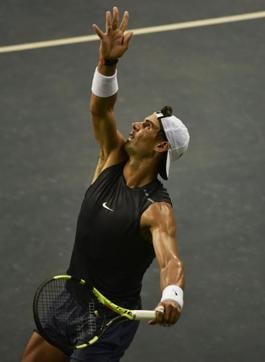 Eyes on the ball: Nadal looks to fine-tune his ball toss during the training session. (Vipin Kumar/HT PHOTO)