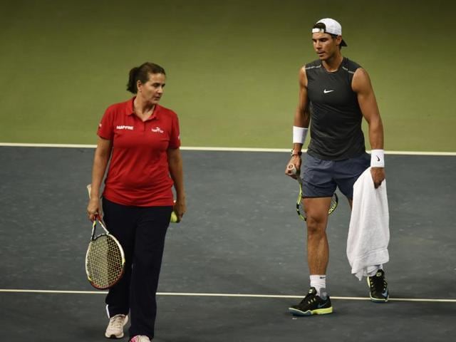 Rafa talks to Conchita Martinez, Spain’s Davis Cup team captain. (Vipin Kumar/HT PHOTO)