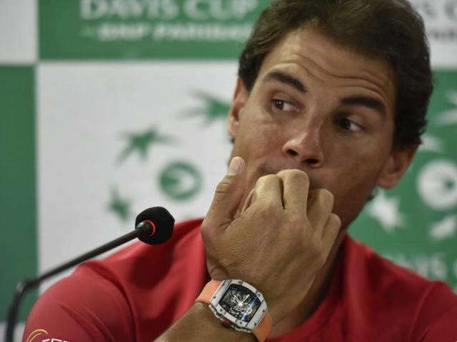 Nadal chews his fingers as he listens to his teammates’ answers during the presser. (Vipin Kumar/HT PHOTO)