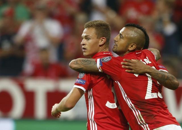 Bayern Munich's Joshua Kimmich celebrates his goal with team mate Arturo Vidal. (REUTERS) Bayern Munich's Joshua Kimmich celebrates his goal with team mate Arturo Vidal. (REUTERS)