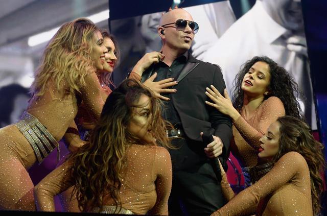 Pitbull onstage mid performance. (AFP) Pitbull onstage mid performance. (AFP)