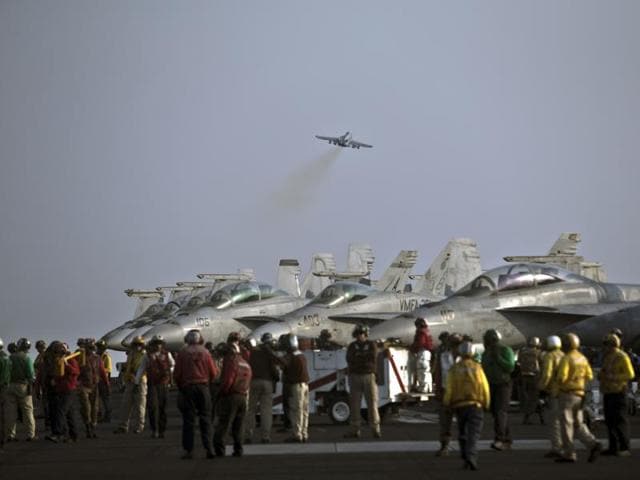 The Iranian military threatened to shoot down two US Navy planes flying over the Strait of Hormuz, a defence official said. (AP File Photo) The Iranian military threatened to shoot down two US Navy planes flying over the Strait of Hormuz, a defence official said. (AP File Photo)