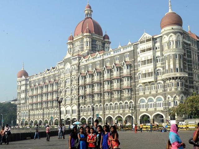 Tourists take photographs outside the iconic Taj Mahal Palace and Hotel -- one of the sites of the 2008 terror attacks in Mumbai. (AFP File Photo) Tourists take photographs outside the iconic Taj Mahal Palace and Hotel -- one of the sites of the 2008 terror attacks in Mumbai. (AFP File Photo)