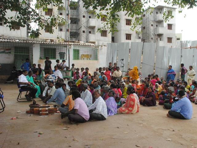 Slum cluster residents in Sanjay Gandhi Nagar gather for a meeting with the social workers. (HT Photo) Slum cluster residents in Sanjay Gandhi Nagar gather for a meeting with the social workers. (HT Photo)