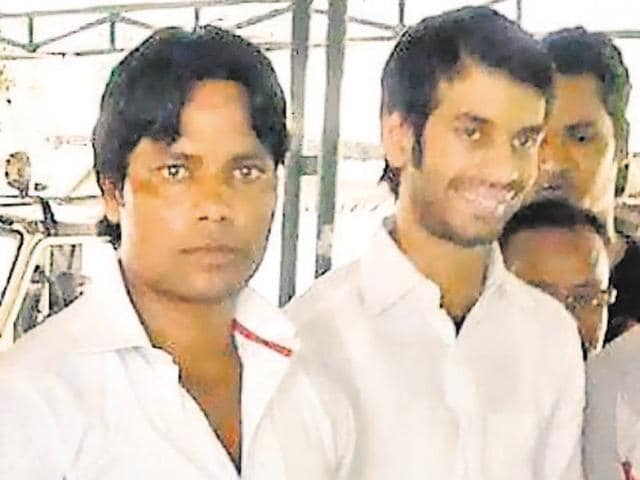 Bihar health minister and RJD chief Lalu Prasad Yadav’s elder son Tej Pratap (right) photographed with Javed Mian, a suspect in the murder of a journalist.