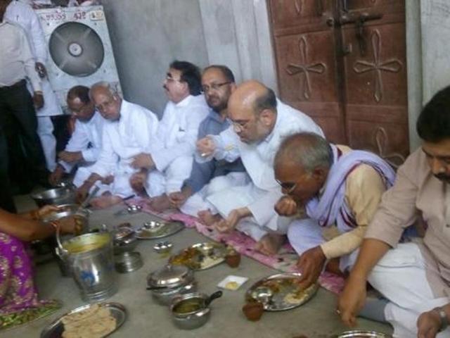 BJP president Amit Shah had lunch with Dalits and other backward class members in May this year, in an effort to woo them before the Uttar Pradesh elections next year. (HT File Photo) BJP president Amit Shah had lunch with Dalits and other backward class members in May this year, in an effort to woo them before the Uttar Pradesh elections next year. (HT File Photo)