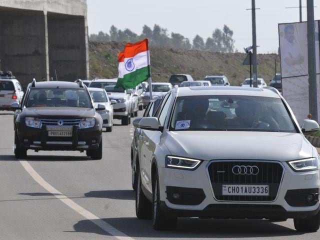 A car rally celebrates the flights to and from Sharjah at the Chandigarh international airport on Thursday evening that established regular international connectivity of the airport. (Keshav Singh/HT Photo) A car rally celebrates the flights to and from Sharjah at the Chandigarh international airport on Thursday evening that established regular international connectivity of the airport. (Keshav Singh/HT Photo)