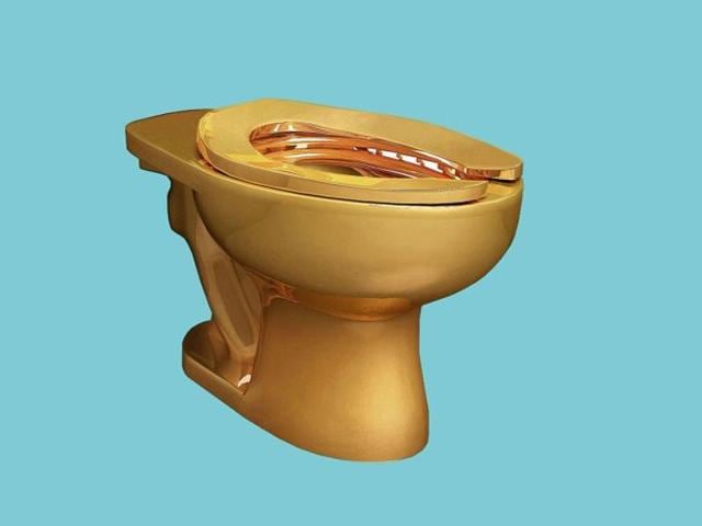 Functional gold toilet named 'America' to open to public at US
