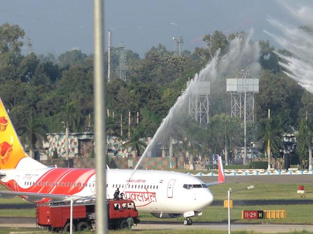 The flight from Sharjah that landed at Chandigarh international airport on Thursday evening gets a water salute as it formally established regular international connectivity of the airport. Later, a flight to Sharjah departed as well. (Keshav Singh/HT Photo) The flight from Sharjah that landed at Chandigarh international airport on Thursday evening gets a water salute as it formally established regular international connectivity of the airport. Later, a flight to Sharjah departed as well. (Keshav Singh/HT Photo)