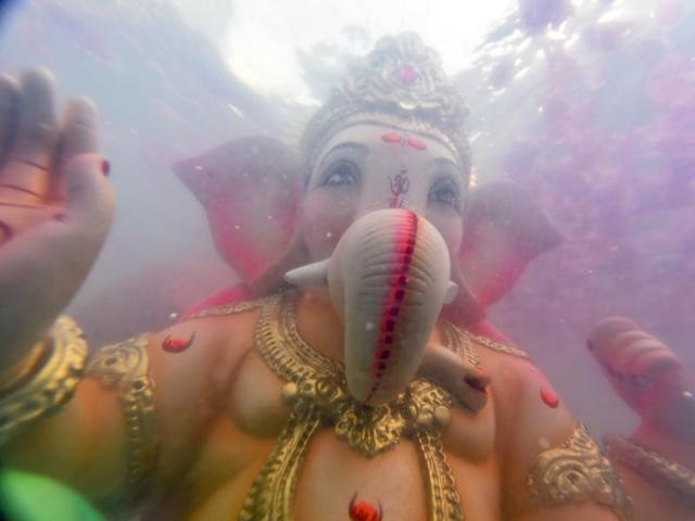 An idol of elephant-headed Hindu god Ganesha floats after it was immersed in a artificial pond during 6th day of Ganesh visarjan at Dadar Beach in Mumbai, India, on Saturday, September 10, 2016. (Kunal Patil/HT Photo) An idol of elephant-headed Hindu god Ganesha floats after it was immersed in a artificial pond during 6th day of Ganesh visarjan at Dadar Beach in Mumbai, India, on Saturday, September 10, 2016. (Kunal Patil/HT Photo)