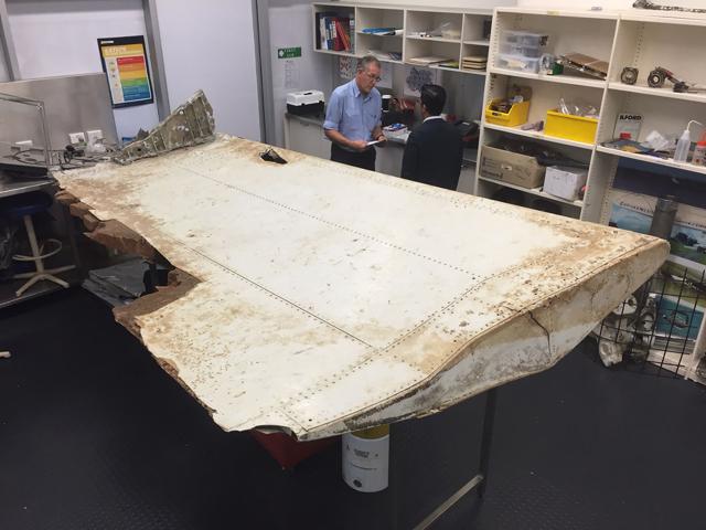 An undated handout photo released by the Australian Transport Safety Board (ATSB) and received on September 15, 2016, shows a large piece of debris found in Tanzania. (AFP) An undated handout photo released by the Australian Transport Safety Board (ATSB) and received on September 15, 2016, shows a large piece of debris found in Tanzania. (AFP)