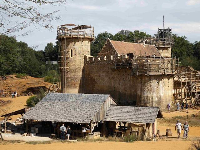 Forgoing all modern technology, blacksmiths, stonemasons and quarrymen are hard at work in France building a 13th century-style castle. (REUTERS)