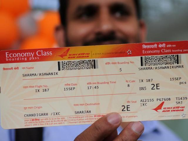 A man shows his boarding pass for the first Chandigarh-Sharjah flight on Thursday.. (Anil Dayal/HT Photo) A man shows his boarding pass for the first Chandigarh-Sharjah flight on Thursday.. (Anil Dayal/HT Photo)