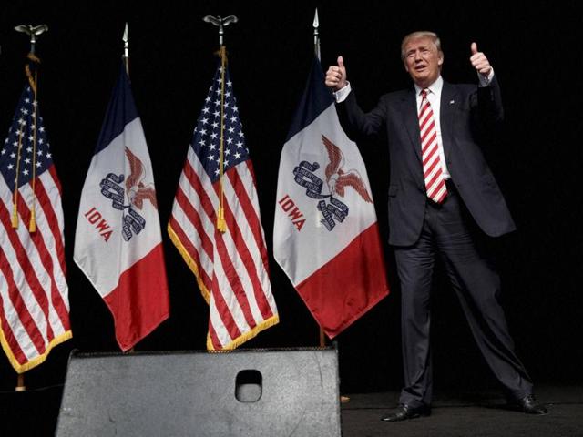 Republican presidential candidate Donald Trump arrives at a campaign rally in Clive, Iowa. (AP Photo) Republican presidential candidate Donald Trump arrives at a campaign rally in Clive, Iowa. (AP Photo)