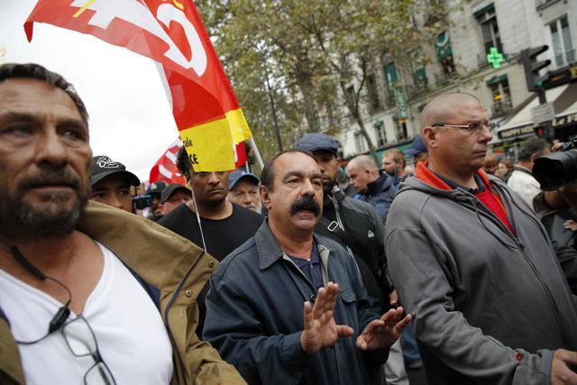 CGT trade union leader Philippe Martinez (centre) marches during a protest in Paris. (AP Photo) CGT trade union leader Philippe Martinez (centre) marches during a protest in Paris. (AP Photo)
