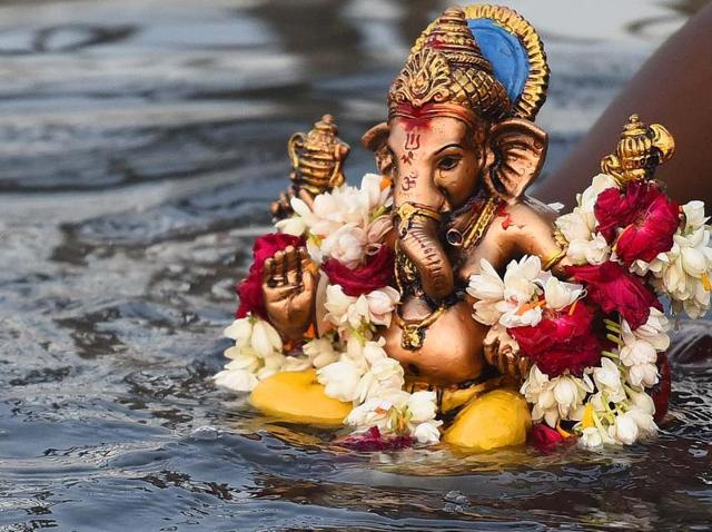 An Idol of lord Ganesha iis being immersed in Yamuna at Okhla during the Ganesh Chaturthi festival. (HT File Photo) An Idol of lord Ganesha iis being immersed in Yamuna at Okhla during the Ganesh Chaturthi festival. (HT File Photo)