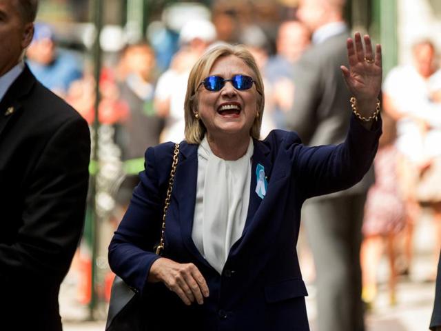 Democratic presidential candidate Hillary Clinton waves after leaving an apartment building in New York on Sept 11, 2016. Hillary Clinton's doctor says she is recovering from her pneumonia and remains "healthy and fit to serve as President of the United States". (AP) Democratic presidential candidate Hillary Clinton waves after leaving an apartment building in New York on Sept 11, 2016. Hillary Clinton's doctor says she is recovering from her pneumonia and remains "healthy and fit to serve as President of the United States". (AP)