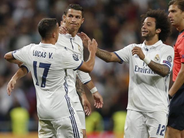 Real Madrid's Cristiano Ronaldo celebrates goal with team mate James Rodriguez. (REUTERS) Real Madrid's Cristiano Ronaldo celebrates goal with team mate James Rodriguez. (REUTERS)