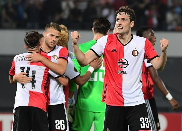 Feyenoord's players celebrate after winning at the end of the UEFA Europa League football match against Manchester United. (AFP Photo) Feyenoord's players celebrate after winning at the end of the UEFA Europa League football match against Manchester United. (AFP Photo)