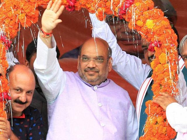 Amit Shah at the ‘Manavta Sadbhav Sammelan” in Kanshiram Smriti Upvan, a memorial set up by Mayawati when she was the chief minister of the state. (PTI) Amit Shah at the ‘Manavta Sadbhav Sammelan” in Kanshiram Smriti Upvan, a memorial set up by Mayawati when she was the chief minister of the state. (PTI)