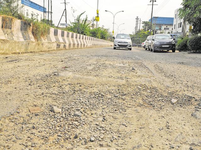 The list has been compiled by residents of sectors 62, 34, 33, 44, 63, 77, 83, 75, among other areas. It includes many broken internal and external roads in these sectors. (Burhaan Kinu/HT Photo) The list has been compiled by residents of sectors 62, 34, 33, 44, 63, 77, 83, 75, among other areas. It includes many broken internal and external roads in these sectors. (Burhaan Kinu/HT Photo)