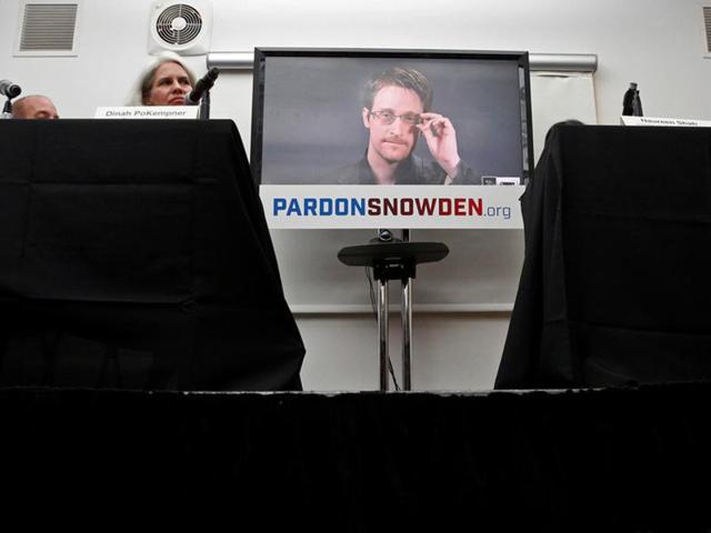 Edward Snowden speaks via video link during a news conference in New York City. (REUTERS) Edward Snowden speaks via video link during a news conference in New York City. (REUTERS)