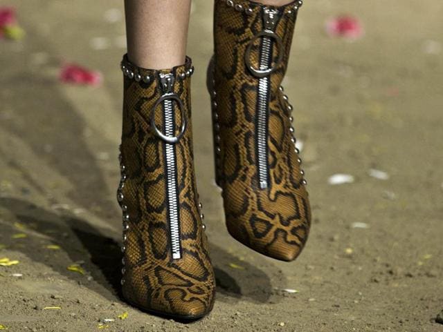 Snakeskin, studs and exposed zips gave the ankle boots at Phillip Lim some serious attitude. (AFP) Snakeskin, studs and exposed zips gave the ankle boots at Phillip Lim some serious attitude. (AFP)