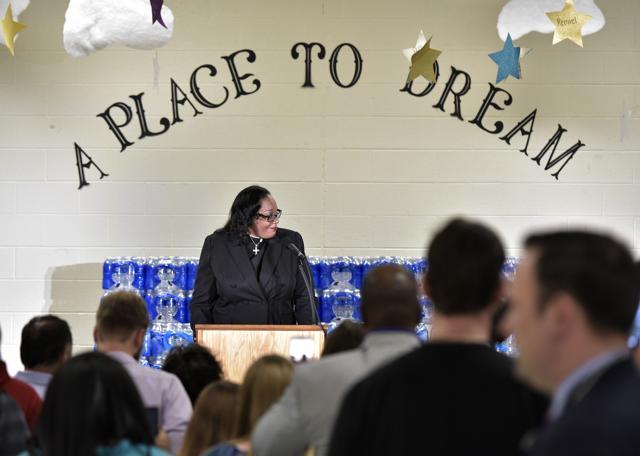 Rev Faith Green Timmons speaks before Trump at the Bethel United Methedoist Church on Wednesday. (AFP)