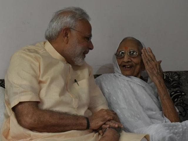 PM Modi meets his mother Hiraba at her Gandhinagar residence on Saturday morning.(Narendra Modi on Twitter)