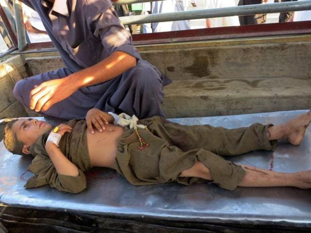 An injured blast victim arrives at a hospital in Bajaur Agency near the Pakistan-Afghanistan border following a suicide bombing at a mosque in the Mohmand tribal district.(AFP Photo)