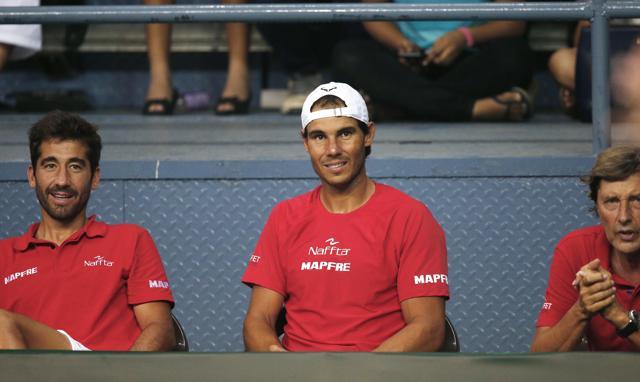 Spain's Rafael Nadal, center, watches a Davis Cup men's tie tennis match between compatriot David Ferrer and India's Saketh Myneni. (AP Photo) Spain's Rafael Nadal, center, watches a Davis Cup men's tie tennis match between compatriot David Ferrer and India's Saketh Myneni. (AP Photo)