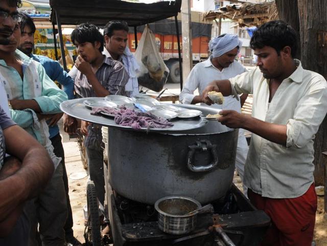 Vendors have stopped selling gosht biryani and have switched to chicken biryani in Mewat after authorities began collecting samples to test for beef in Gurgaon.(Parveen Kumar/HT Photo)