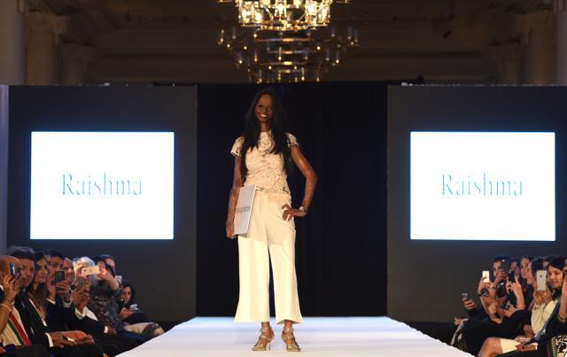 Acid attack survivor Laxmi Aggarwal walks the ramp at a fashion show in London. (Reuters ) Acid attack survivor Laxmi Aggarwal walks the ramp at a fashion show in London. (Reuters )