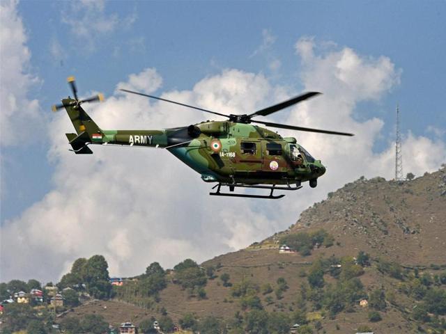 A chopper air-lifting injured soldiers after Army Brigade camp was attacked by militants in Uri. (PTI Photo) A chopper air-lifting injured soldiers after Army Brigade camp was attacked by militants in Uri. (PTI Photo)