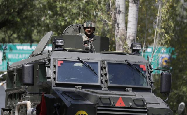 A soldier guards the army base which was attacked by militants in Uri, Jammu and Kashmir. (AP Photo) A soldier guards the army base which was attacked by militants in Uri, Jammu and Kashmir. (AP Photo)