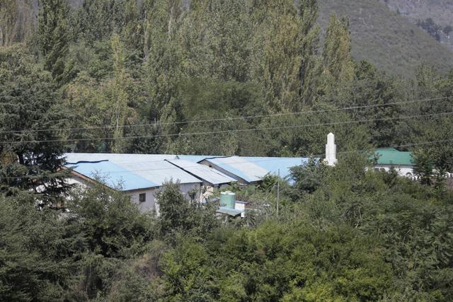 A view of the Indian army base which was attacked by militants in Jammu and Kashmir’s Uri town. (AP Photo) A view of the Indian army base which was attacked by militants in Jammu and Kashmir’s Uri town. (AP Photo)
