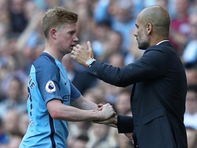 Manchester City's Kevin De Bruyne is congratulated by manager Pep Guardiola. (REUTERS) Manchester City's Kevin De Bruyne is congratulated by manager Pep Guardiola. (REUTERS)