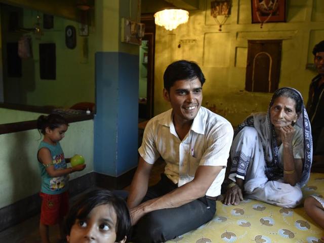 Kapil Gupt, a young man from the Gayawal Panda community, with his grandmother Chameli Devi at their house in Gaya. (Saumya Khandelwal/HT PHOTO) Kapil Gupt, a young man from the Gayawal Panda community, with his grandmother Chameli Devi at their house in Gaya. (Saumya Khandelwal/HT PHOTO)
