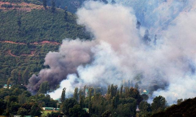 Smoke rises from the army brigade camp during a terror attack in Uri, Jammu and Kashmir on Sunday. (PTI Photo) Smoke rises from the army brigade camp during a terror attack in Uri, Jammu and Kashmir on Sunday. (PTI Photo)