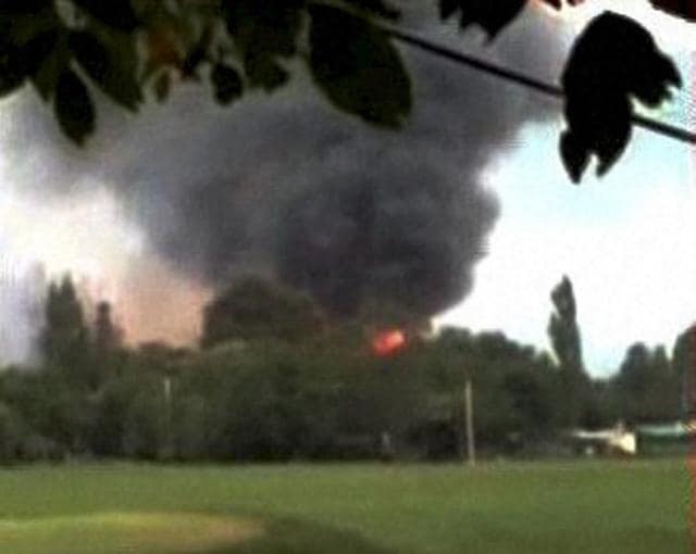 Flames and smoke rise from the army camp during the terror attack in Uri. (PTI Photo/TV grab) Flames and smoke rise from the army camp during the terror attack in Uri. (PTI Photo/TV grab)