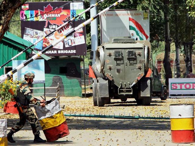 Army personnel in action inside the army brigade camp during a terror attack in Uri, Jammu and Kashmir.(PTI)