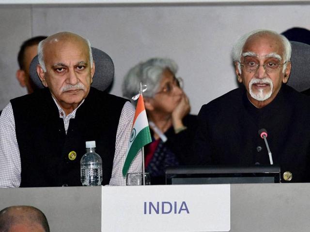 Vice-president M Hamid Ansari speaks as minister of state for foreign affairs MJ Akbar looks on at the 17th Summit of the Non Aligned Movement (NAM) at Margarita Island in Venezuela. (PTI Photo) Vice-president M Hamid Ansari speaks as minister of state for foreign affairs MJ Akbar looks on at the 17th Summit of the Non Aligned Movement (NAM) at Margarita Island in Venezuela. (PTI Photo)