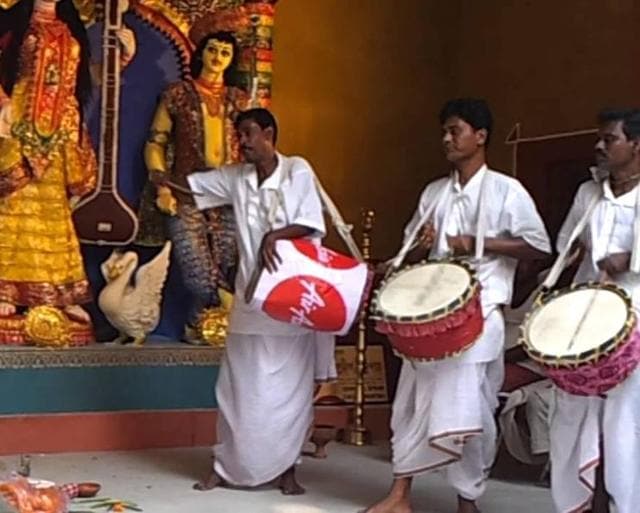 At the onset of autumn they cross the border every year, carrying dhaks on their backs. For the next few days, they work up a traditional rhythm at Puja pandals on this side of the border, earning a few extra bucks and, more importantly, lending an emotional touch to Bengal’s biggest festival. But not this time.(Wikipedia)