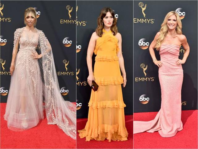 Not for the eyes: Though actor Mandy Moore (C), and TV personalities Giuliana Rancic (L) and Debbie Matenopoulos tried to stand out with their pastel dresses, but their experiments didn’t do much for them. (Agencies)