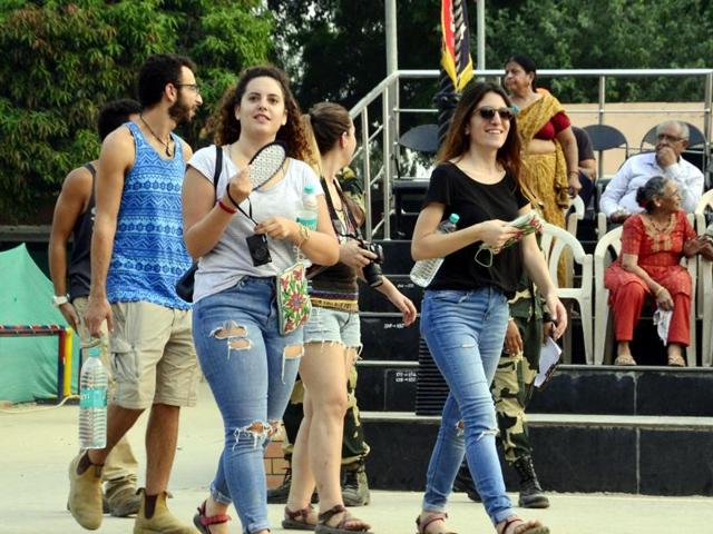Tourists arriving at the border with no look of fear post attack. (Sameer Sehgal/HT Photo)