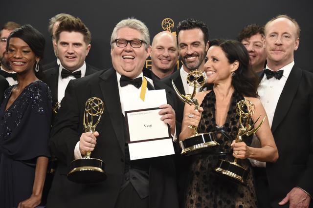David Mandel, centre, Julia Louis-Dreyfus, foreground right, and the cast and crew from Veep winners of the award for outstanding comedy series pose in the press room at the 68th Primetime Emmy Awards. (Jordan Strauss/Invision/AP) David Mandel, centre, Julia Louis-Dreyfus, foreground right, and the cast and crew from Veep winners of the award for outstanding comedy series pose in the press room at the 68th Primetime Emmy Awards. (Jordan Strauss/Invision/AP)